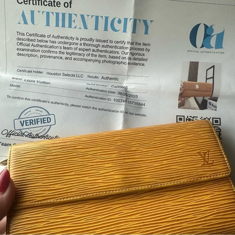 Louis Vuitton Yellow Epi Long Wallet with Purple Interior.